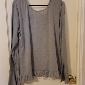 Super cute top.  Fits like XL